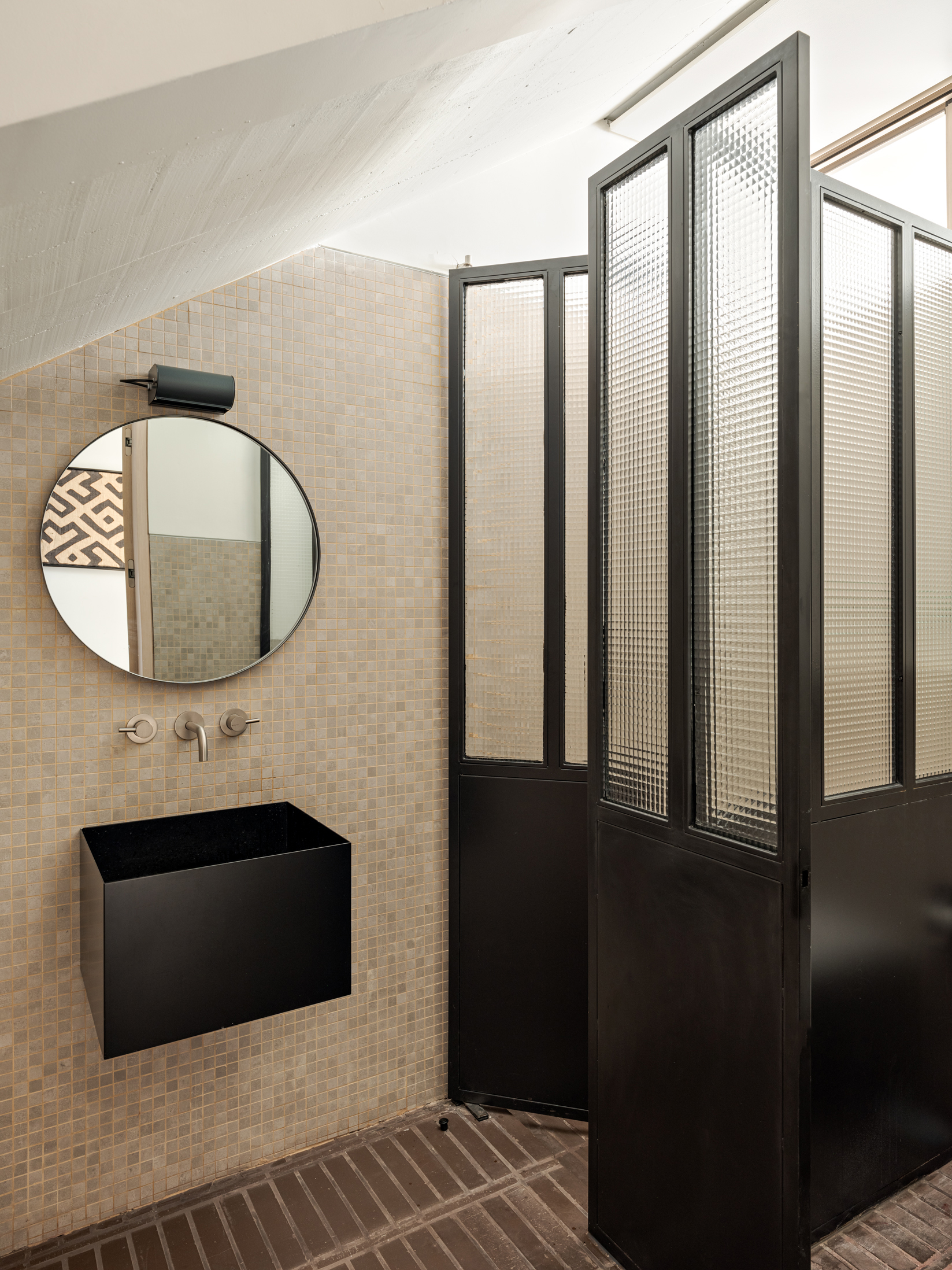 Bathrooms are screened with half-glazed doors