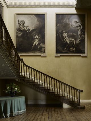 Crichel, Dorset: The 1740s stair was moved and adapted by James Wyatt in the 1770s. The panels by Cipriani are from Arlington Street in London and were installed in the late 1920s