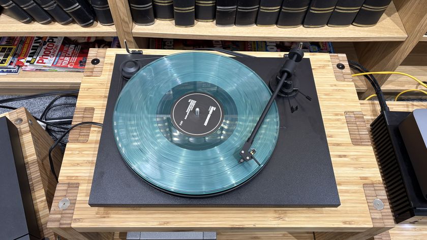 Pro-Ject Primary E turntable on wooden rack
