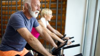 Seniors on exercise bikes