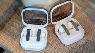 White Samsung Galaxy Buds 4 Pro with cases