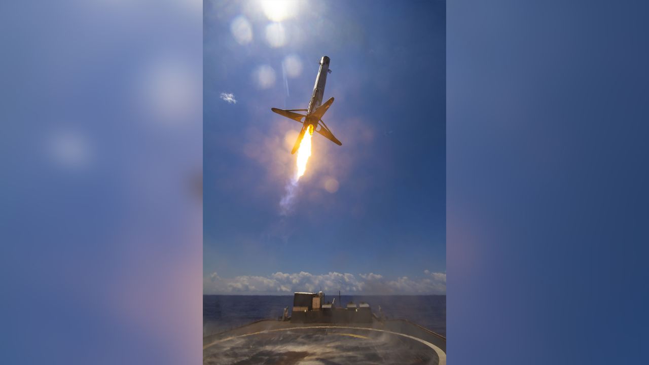 A SpaceX Falcon 9 rocket comes in for a stunning landing on a drone ship after launching the GPS III SV05 satellite for the U.S. Space Force on June 17, 2021.