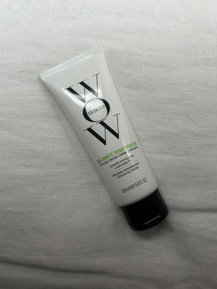 The Color Wow One Minute Transformation Styling Cream on a white linen background
