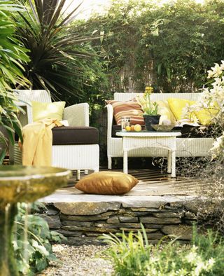 Tropical style outdoor place with yellow accessories