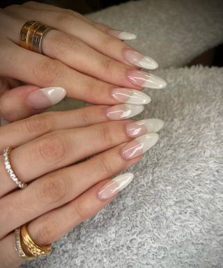 Foggy French manicure on Madison Beer by celebrity nail artist Sreynin Peng.