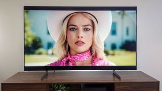 Samsung S85D OLED TV on stand in living room