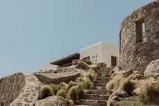 Anamesa by K-Studio, contemporary Mykonos House within white and minimalist yet sleek forms and inside outside living arrangements