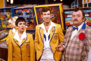 Hi-de-Hi cast: Jeffrey Holland as Spike (centre) with Paul Shane as Ted Bovis and Ruth Madoc as Gladys Pugh.