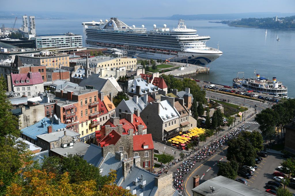 QUEBEC CITY QUEBEC SEPTEMBER 09 A general view of the peloton passing through Qubec City during the 11th Grand Prix Cycliste de Qubec 2022 a 2016km one day race from Quebec to Quebec GPCQM on September 09 2022 in Quebec City Quebec Photo by Dario BelingheriGetty Images
