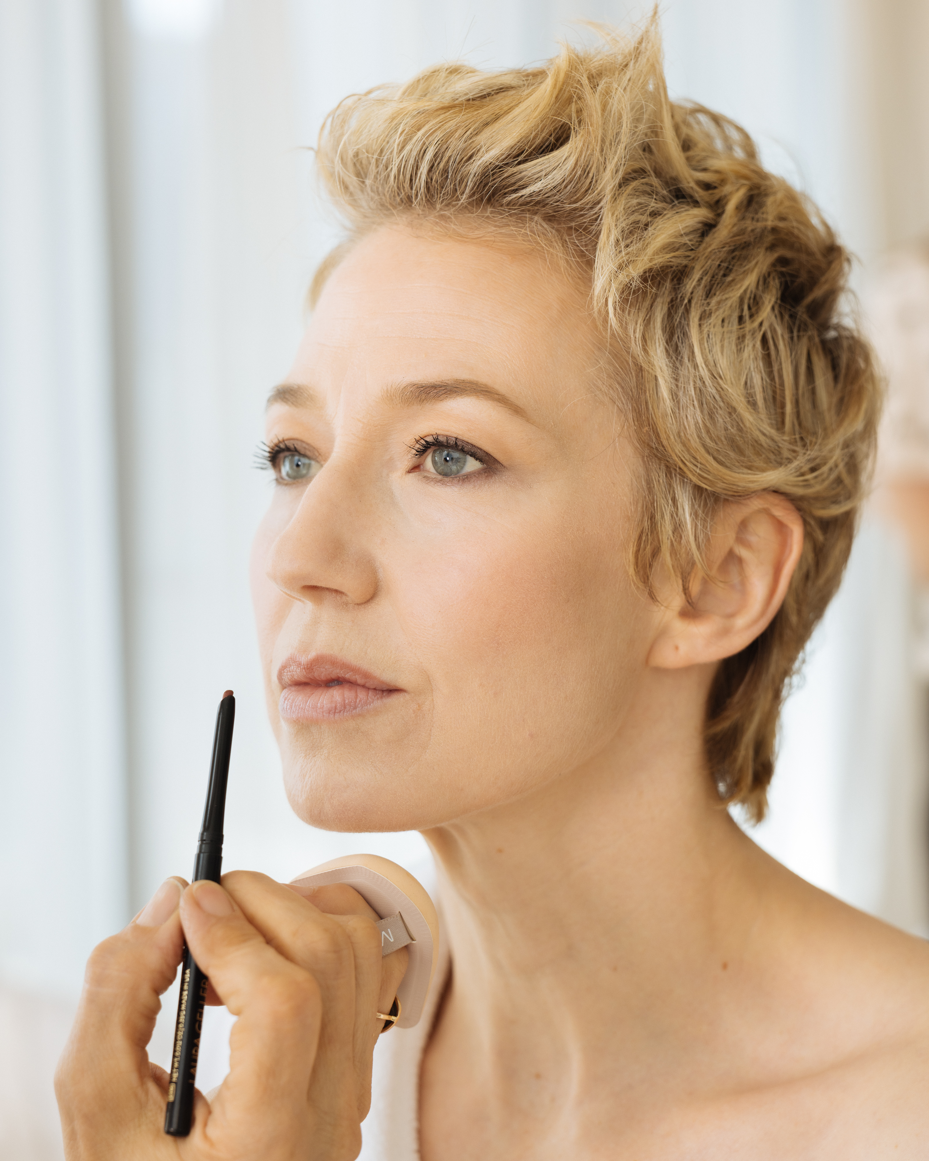 Carrie Coon getting her makeup done for the 2026 Tony Awards