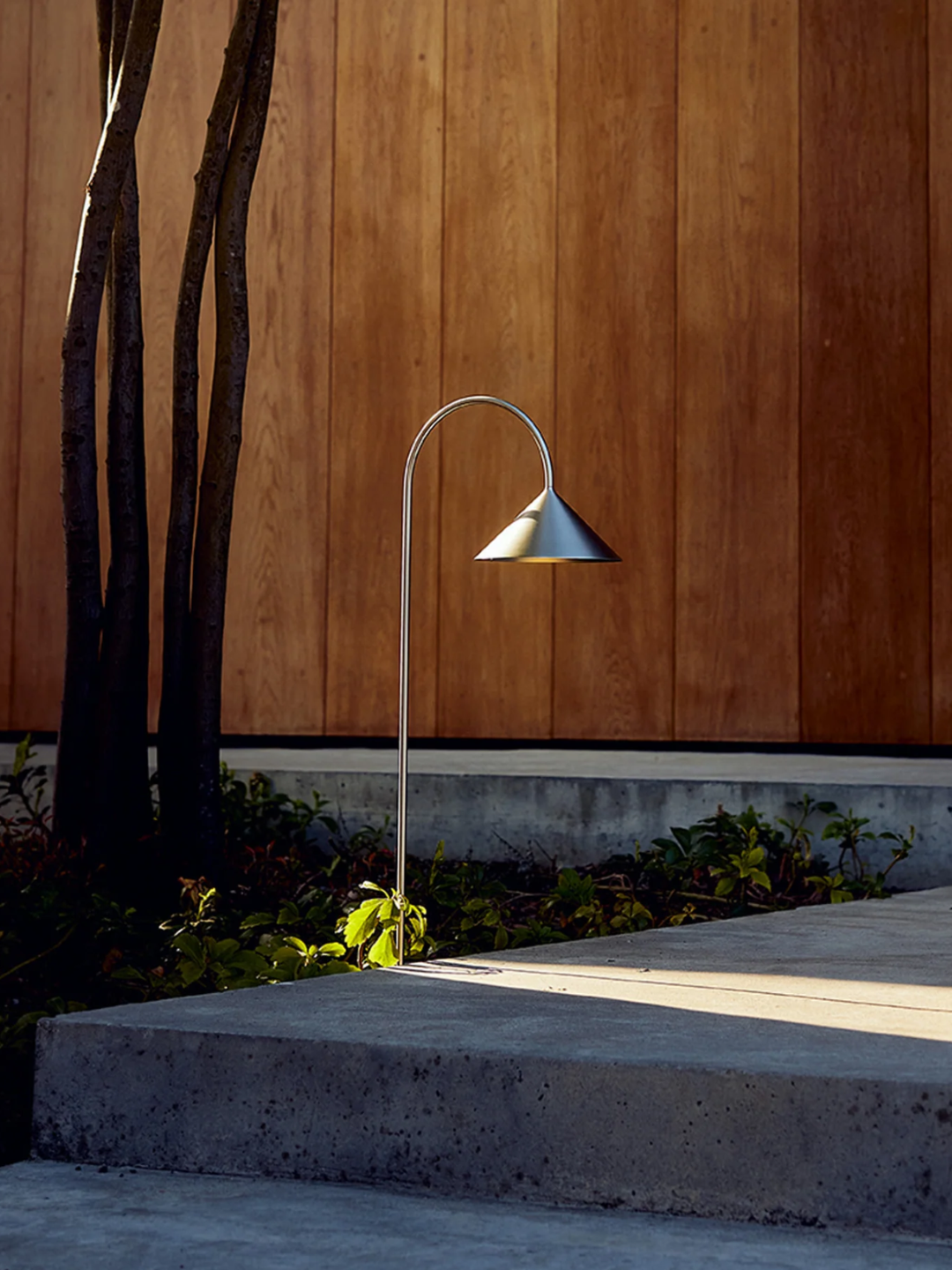 A brushed silver outdoor spike light from Frandsen