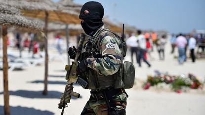 Armed guards patrol Marhaba beach, Tunisia