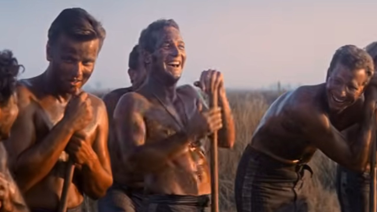 Paul Newman laughing with the boys in Cool Hand Luke