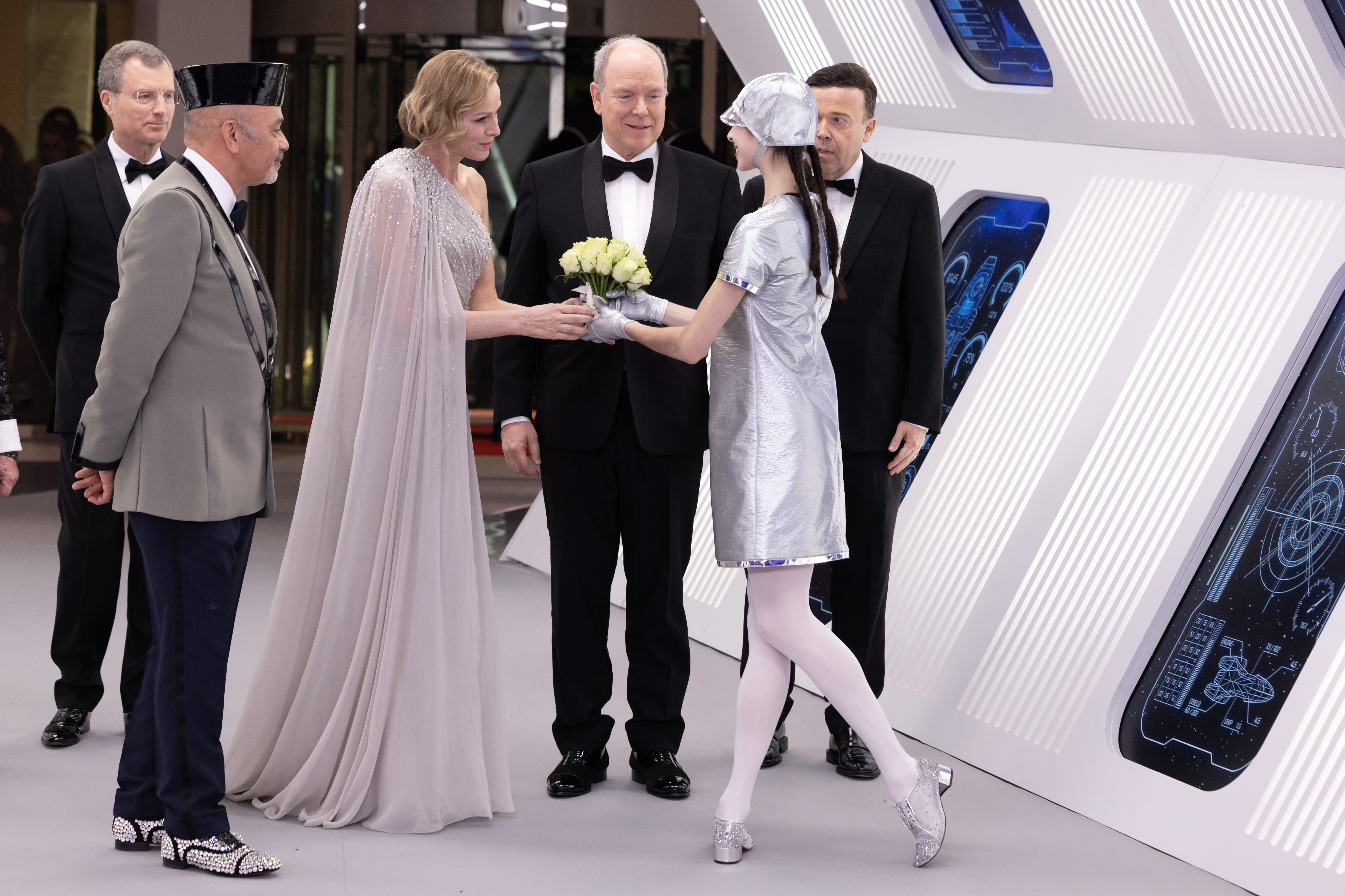 Princess Charlene of Monaco attends the Rose Ball 2026 Photocall on March 21, 2026 wearing a glittering sequin caped gown from Elie Saab