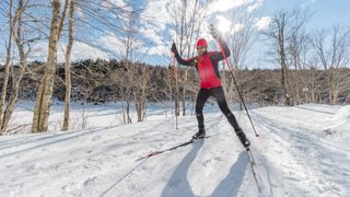 A man cross country skiing in the backcountry