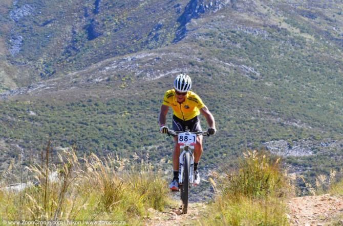 Race leader, Brandon Stewart of FedGroup Itec, reaches the top of a climb in the Kammanassie Mountains during Stage 4