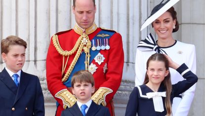 princess charlotte and princess kate on the balcony of buckingham palace for trooping the color in matching outfits