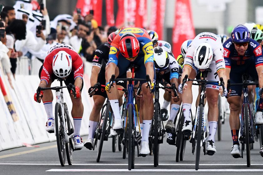 QIDFA UNITED ARAB EMIRATES FEBRUARY 20 LR Dylan Groenewegen of The Netherlands and Team Jayco AlUla Jonathan Milan of Italy and Team LidlTrek and Tim Merlier of Belgium and Team Soudal QuickStep sprint at finish line during the 7th UAE Tour 2025 Stage 4 a 181km stage from Fujairah Qidfa Beach to Umm al Quwain UCIWWT on February 20 2025 in Fujairah Qidfa Beach United Arab Emirates Photo by Dario BelingheriGetty Images