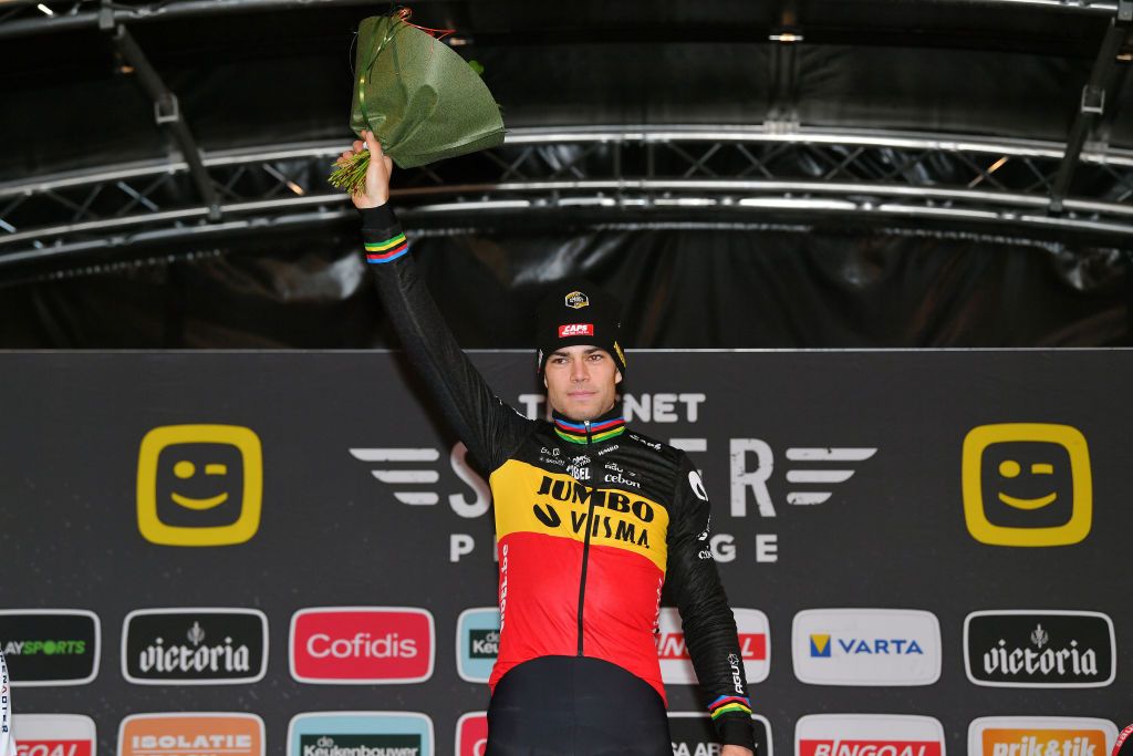 ZOLDER BELGIUM DECEMBER 27 Wout Van Aert of Belgium and Team JumboVisma celebrates winning the race on the podium ceremony after the 17th Superprestige HeusdenZolder 2021 Mens Elite SuperprestigeCX SPHeusdenZolder on December 27 2021 in Zolder Belgium Photo by Luc ClaessenGetty Images