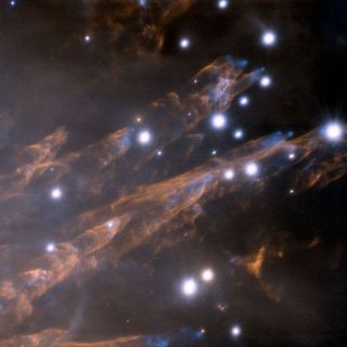 Cosmic Bullets Pierce Space Cloud