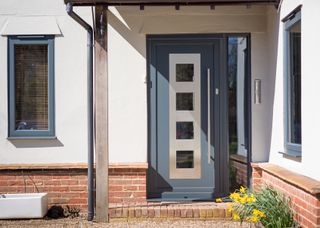 an aluminium front door with glazed panels