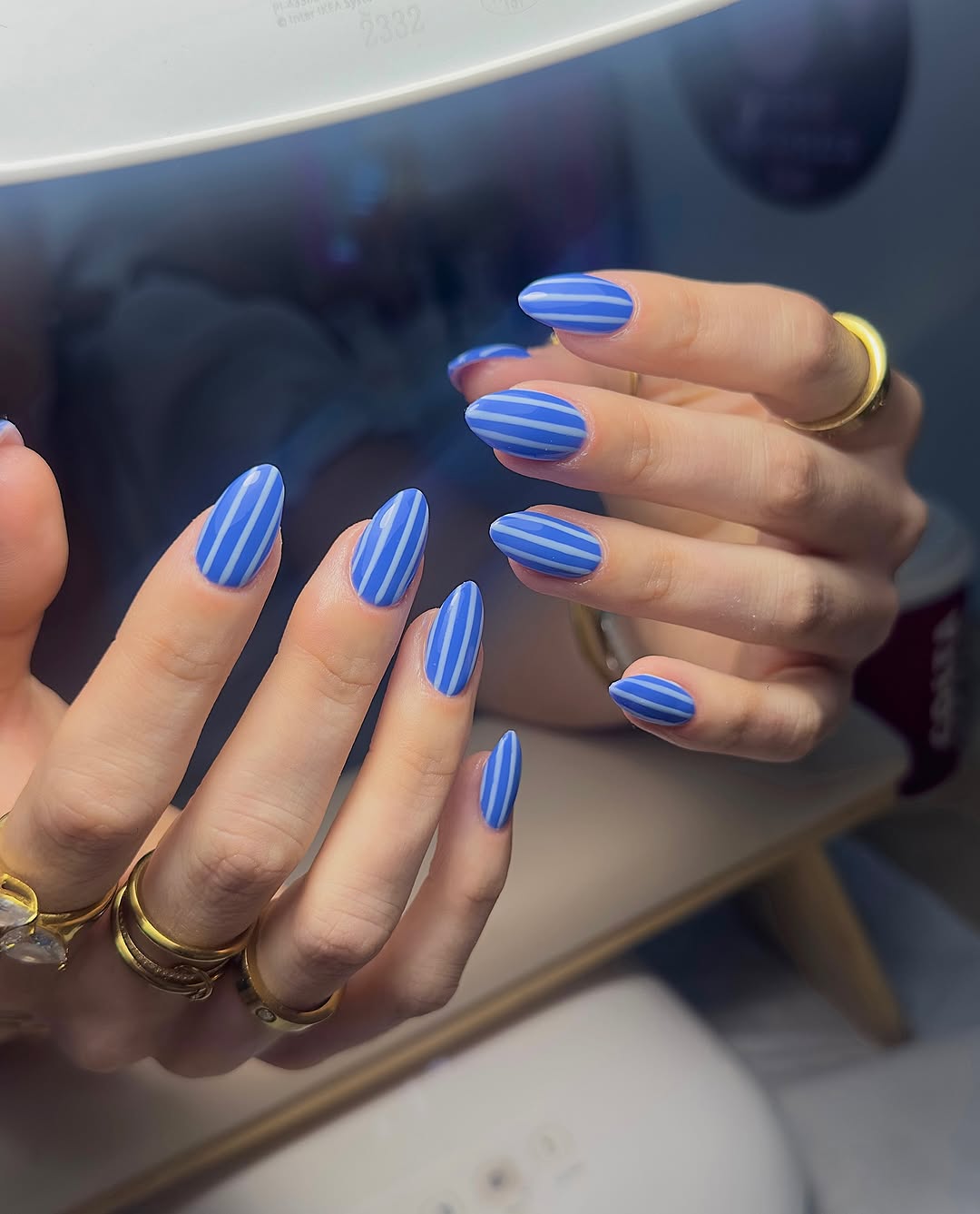 striped blue on blue tonal manicure