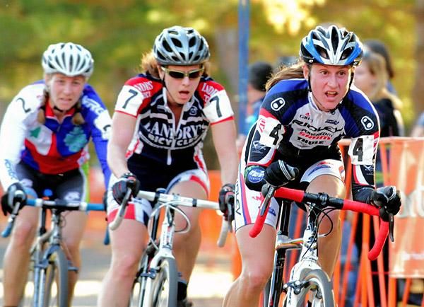 Rebecca Wellons (Ridley) in a group of three on the pavement.
