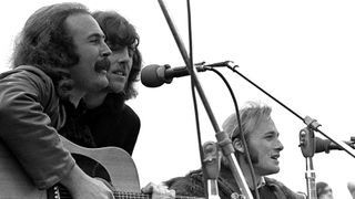 Crosby, Stills and Nash and Young (L-R David Crosby, Graham Nash and Stephen Stills) perform onstage at the Big Sur Folk Festival held at the Esalen Institue on September, 15 1969 in Big Sur, California