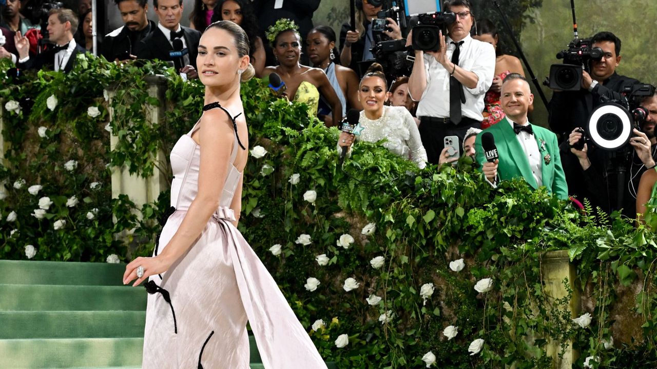 Lily James on the red carpet at the met gala 2024 - Gettyimages 2151227443