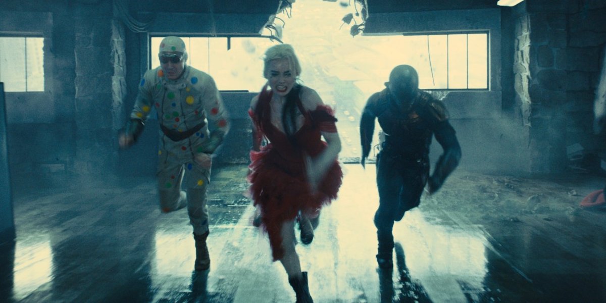 David Dastmalchian, Margo Robbie, and Idris Elba in The Suicide Squad