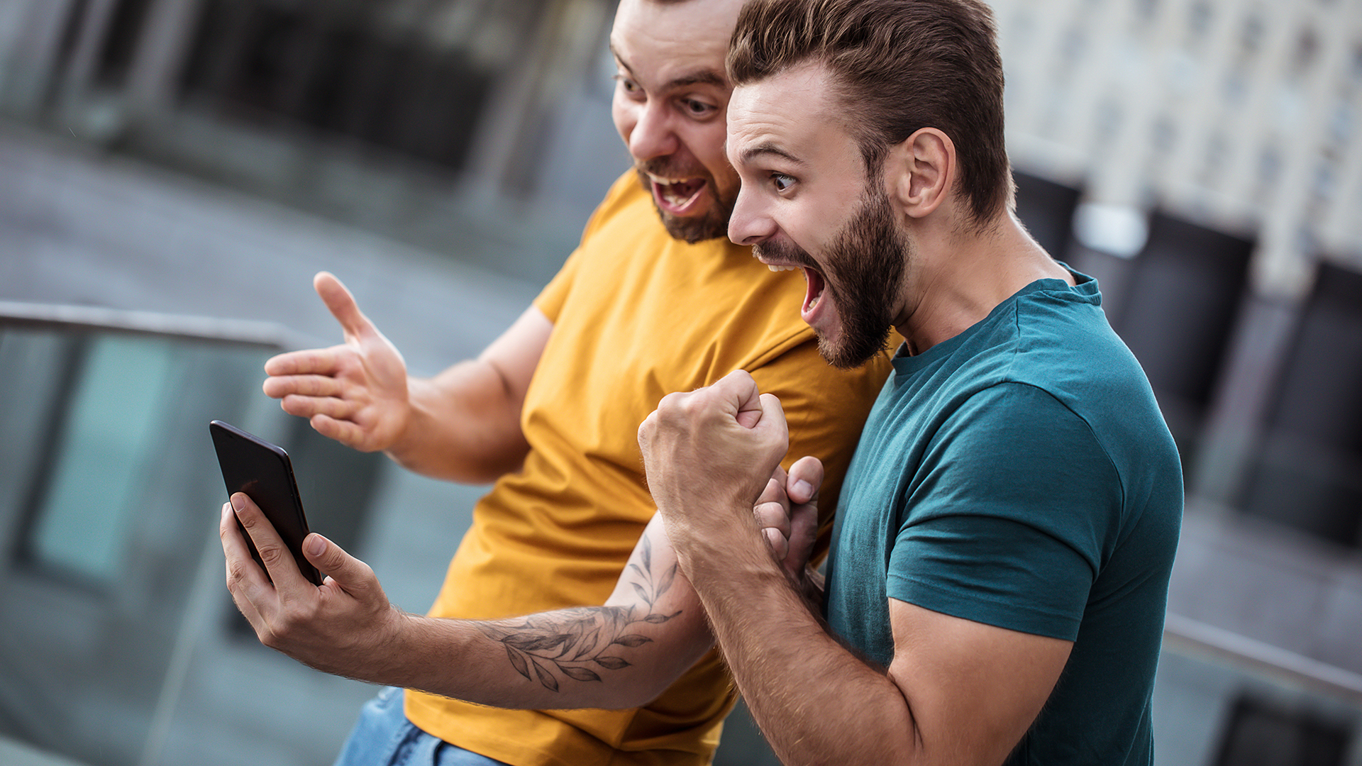 Football fans happy watching the game