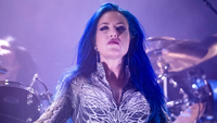 Alissa White-Gluz onstage with Arch Enemy in 2025