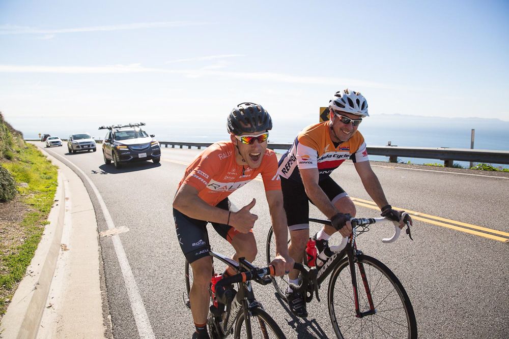 Tom Soladay provides some one-on-one motivation during one of the steepest sections of the group rides on Palos Verdes Road.