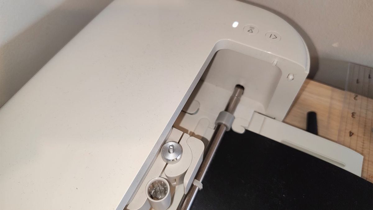 A digital crafting machine on a table