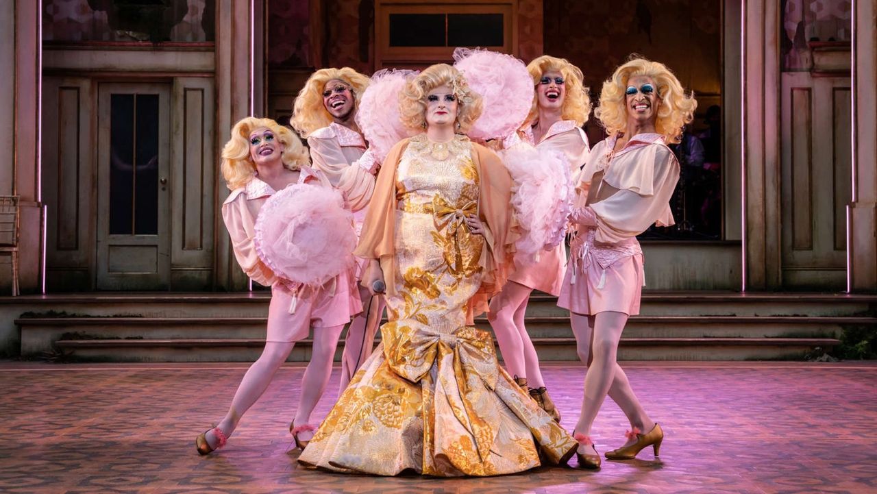 Carl Mullaney and the Cagelles in La Cage aux Folles