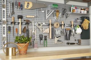 garage wall with hanging space for tools