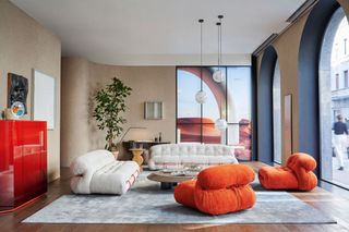 The interiors of Cassina's Milan showroom with furniture by Tobia Scarpa