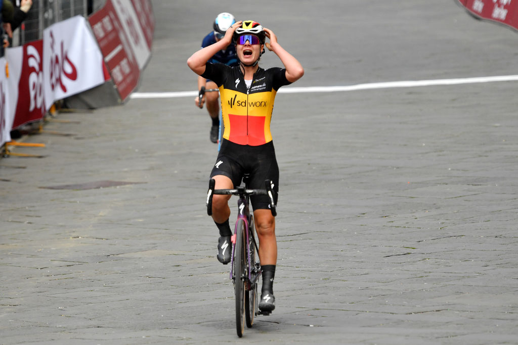 SIENA ITALY MARCH 05 Lotte Kopecky of Belgium and Team SD Worx celebrates winning during the Eroica 8th Strade Bianche 2022 Womens Elite a 136km one day race from Siena to Siena Piazza del Campo 321m StradeBianche on March 05 2022 in Siena Italy Photo by Luc ClaessenGetty Images