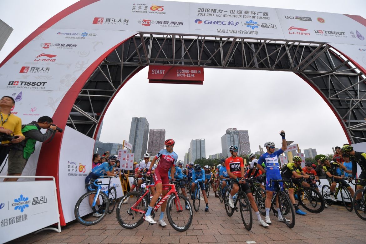 The riders line up at the start
