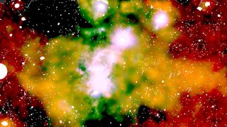 Clouds of red, yellow, green and pink gas represent X-ray radiation at the Milky Way's turbulent center