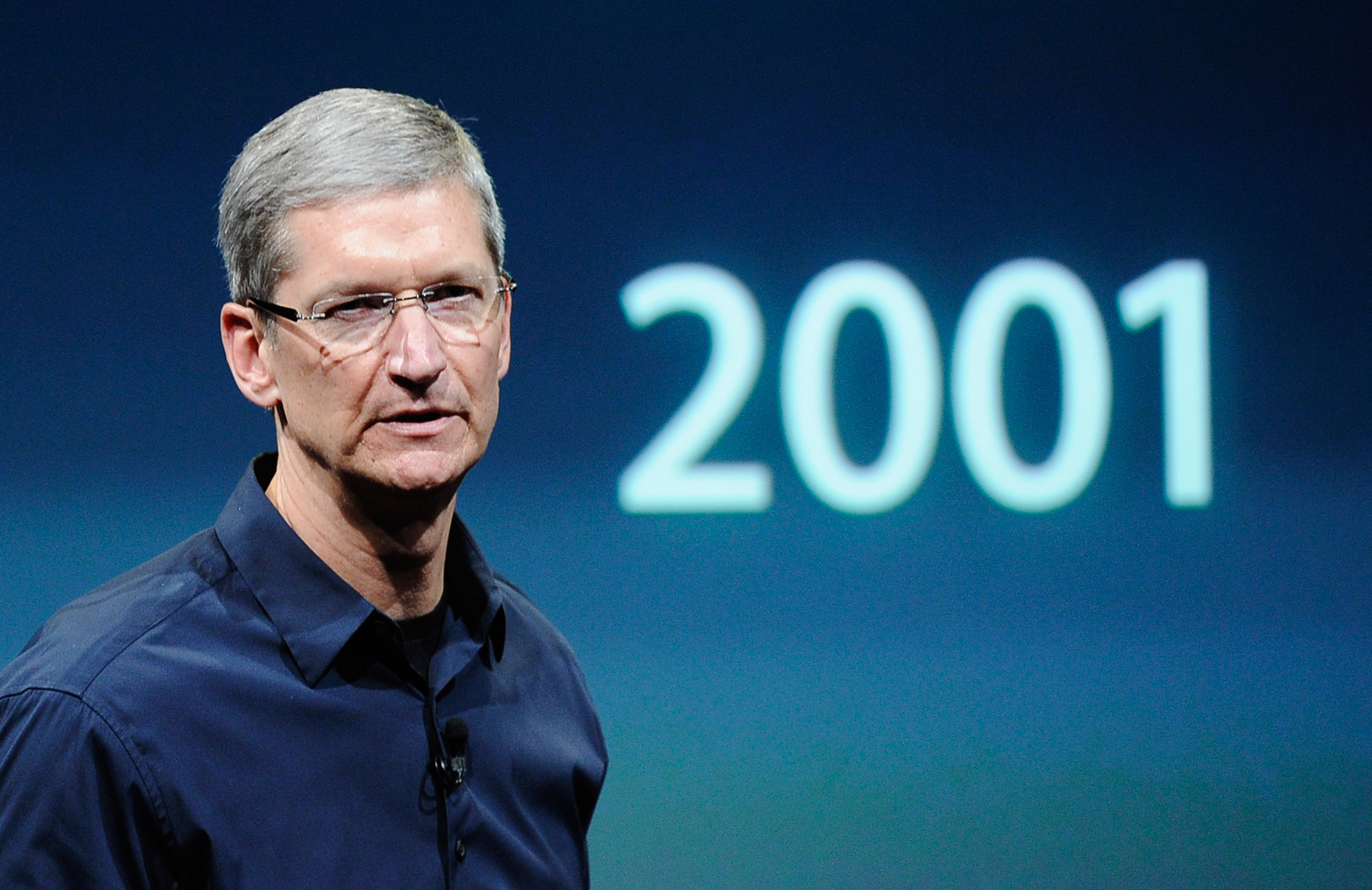 Apple CEO Tim Cook announcing the new iPhone 4s at the company's headquarters October 4, 2011 in Cupertino, California
