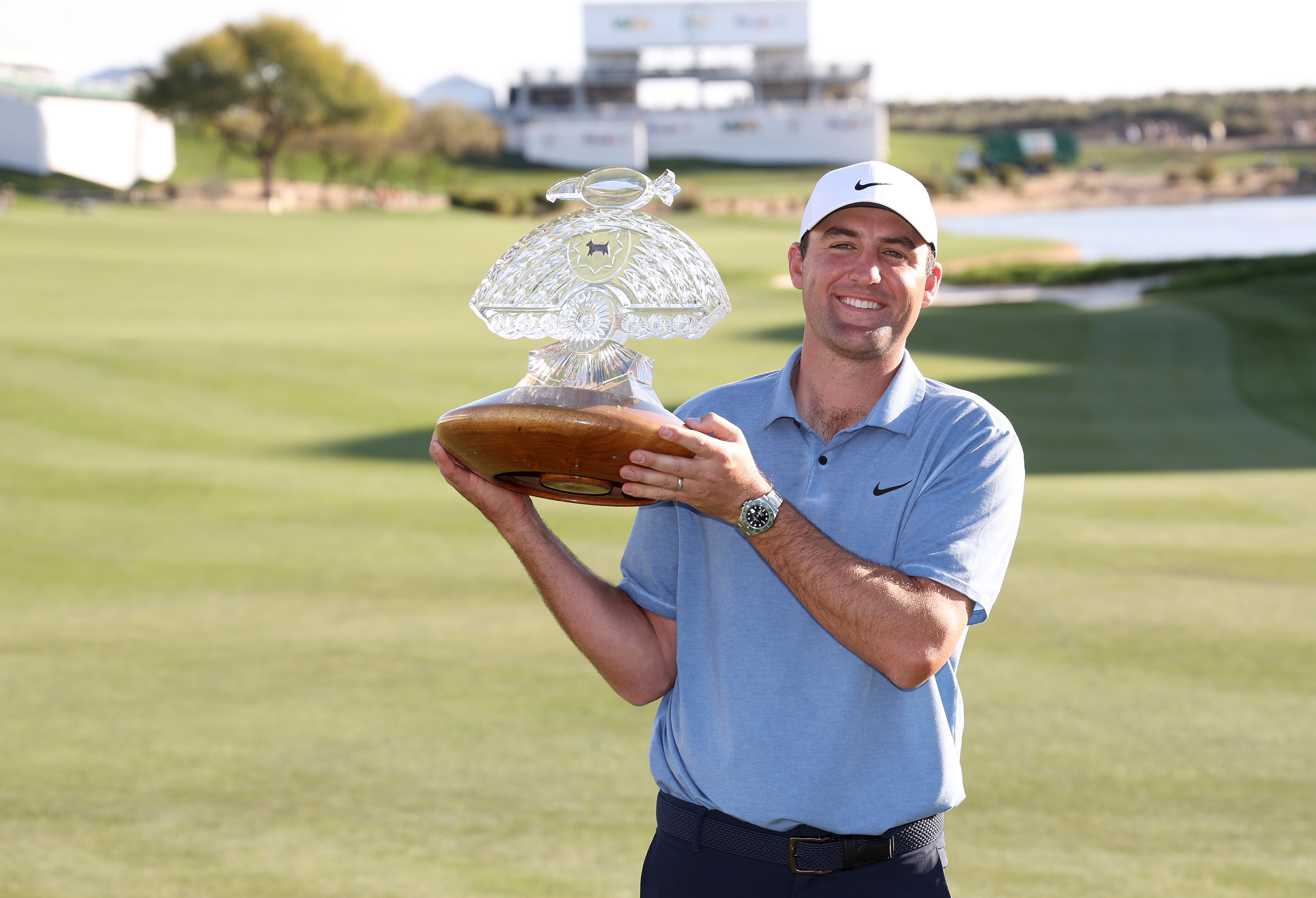 Scottie Scheffler holds the WM Phoenix Open trophy