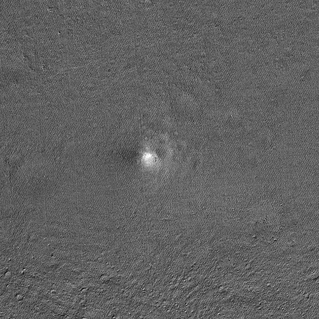 A composite image dividing the before image from after. Features that are the same in both images disappear, highlighting the changes in surface brightness from the rocket plume. The image is 2,887 feet wide (880 meters), and lunar north is up.