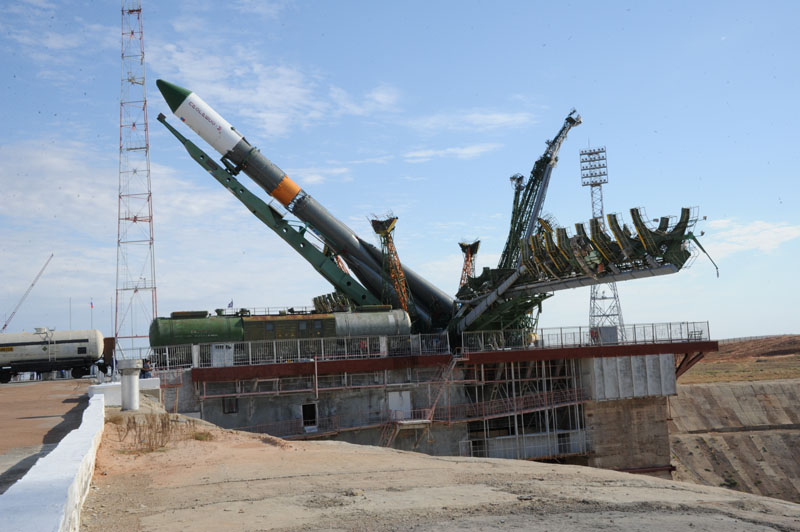 The unmanned Russian supply ship Progress 48 is raised into launch position ahead of its Aug. 1, 2012 EDT launch