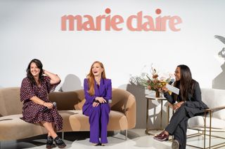 Jessica Chastain speaks to Kelly Carmichael andNischelle Turner during a panel at Marie Claire's 2022 Power Trip summit.