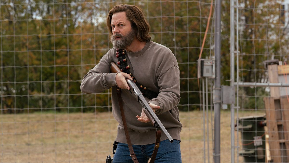 Bill (Nick Offerman) holding a shotgun in The Last Of Us episode 3