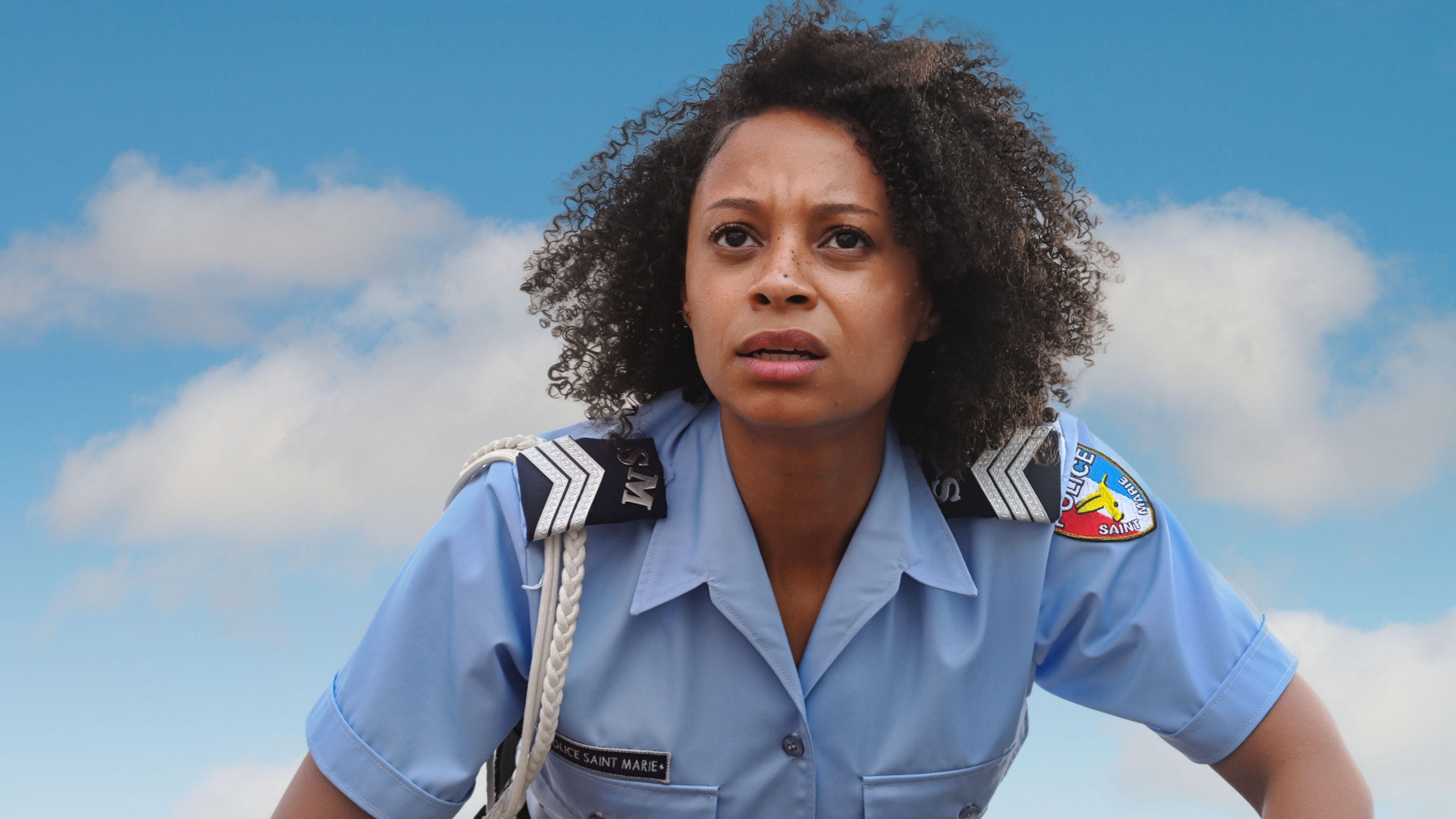 Sergeant Mattie Fletcher (CATHERINE GARTON) in Death in Paradise season 15