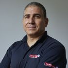 A headshot of Tony King