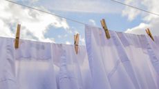 While shirts hanging on a washing line