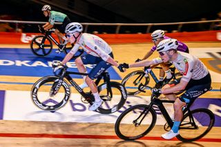 Ethan Hayter and Fred Wright exchange during the Gent Six Day